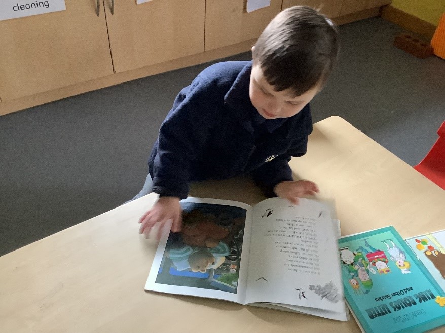 Pupil looking at a book
